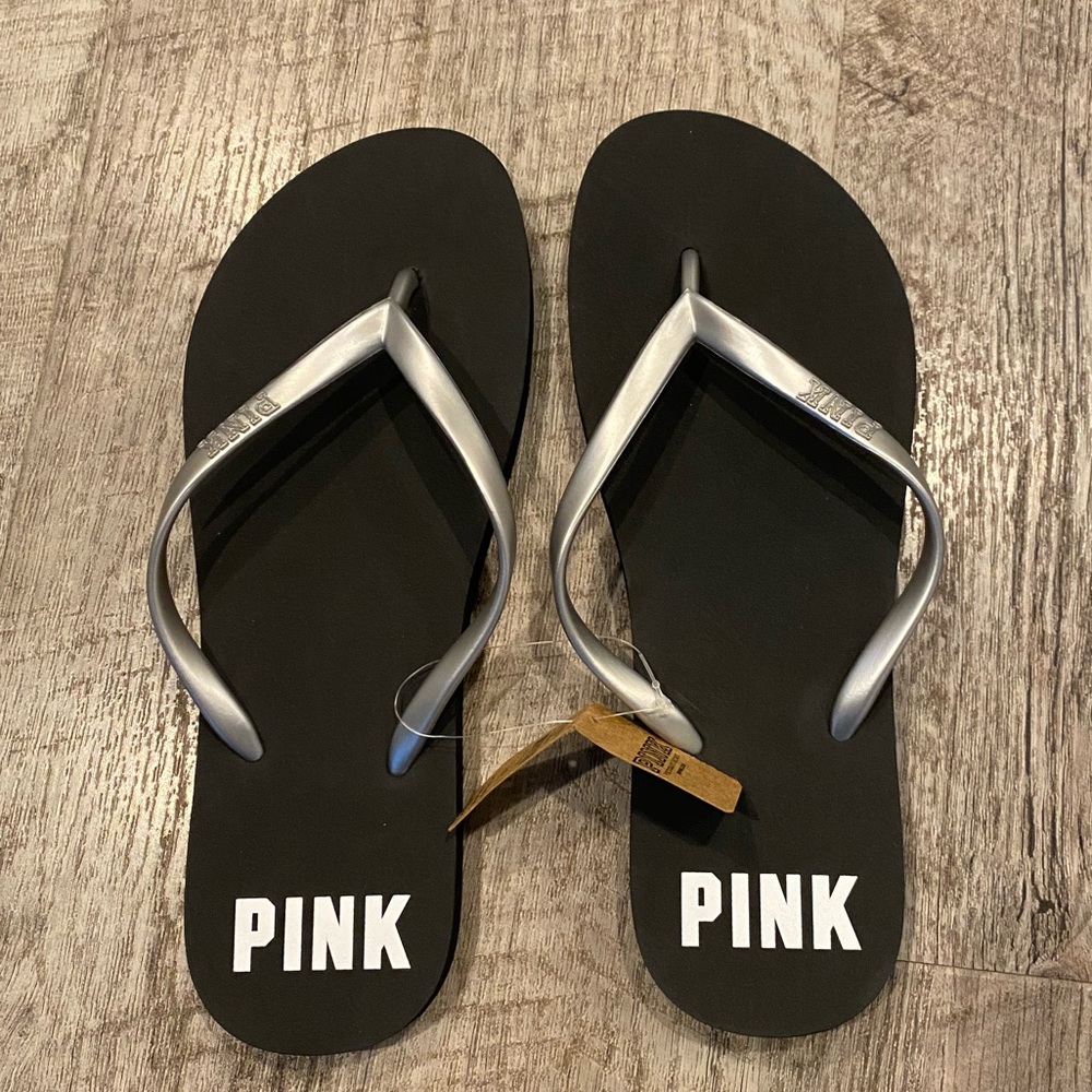 Pink flip flops NWT size large (9/10)